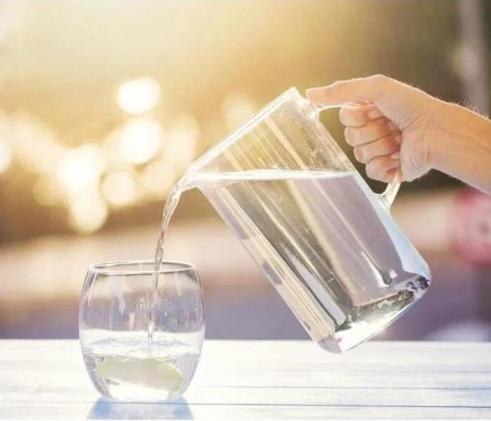 Pitcher of Pouring Water
