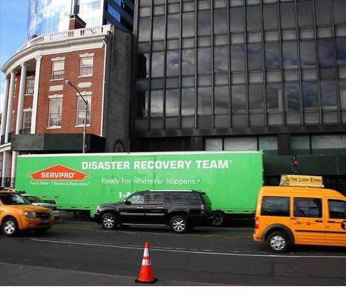 Servpro trailer in front to commercial building